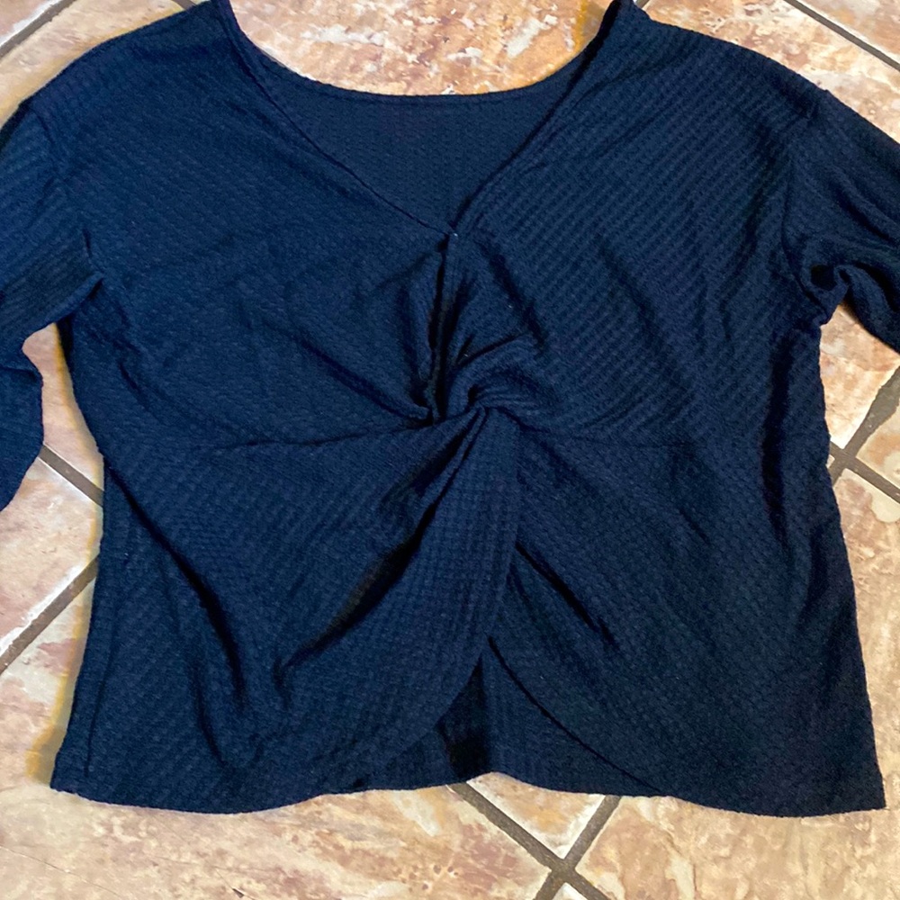 Waffle knit open back black top.